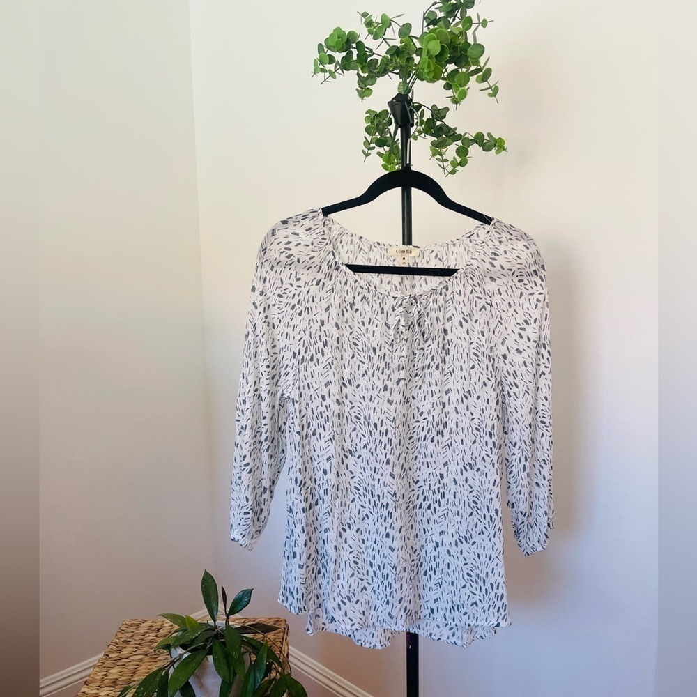 Super cute fresh and flowy white and blue blouse